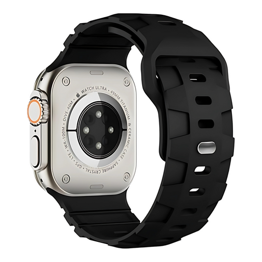 Apple watch ultra with a black band on a white background