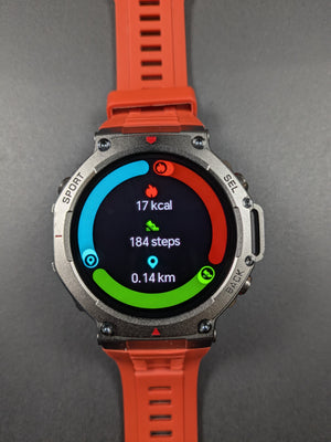 Smartwatch with an red band on a gray background